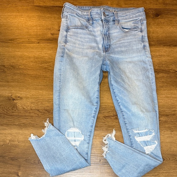 American Eagle Outfitters Denim - American Eagle Super Stretch Hi Rise Jegging Crop Light Wash Ripped Raw Hem Sz 8